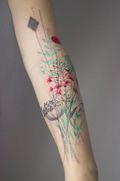 Tatouage-fleuris15_97886092_north_607x