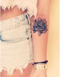 Tatouage-fleuris27_586483841_north_607x